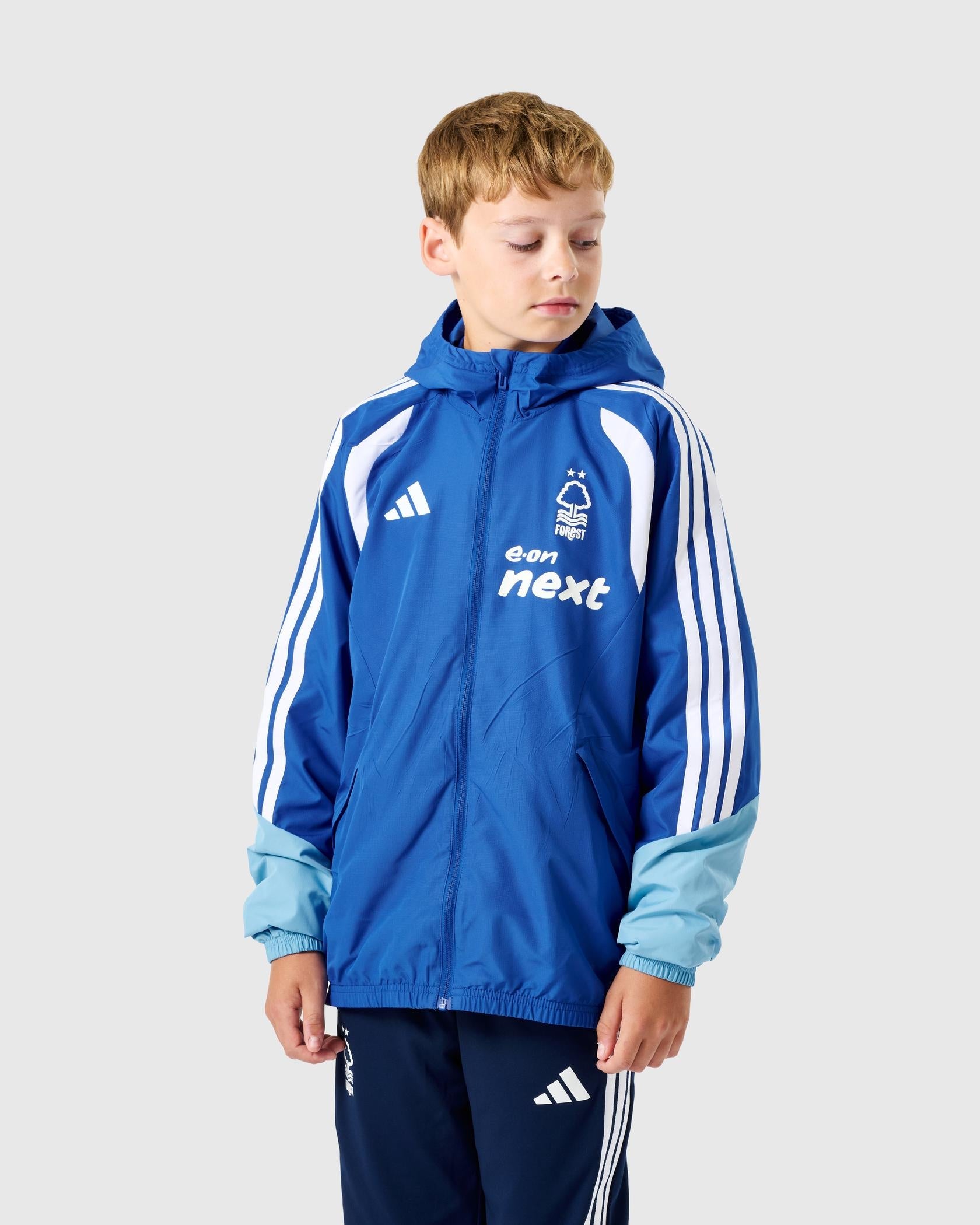 NFFC 26/27 Junior Royal Blue Training All Weather Jacket - Nottingham Forest FC